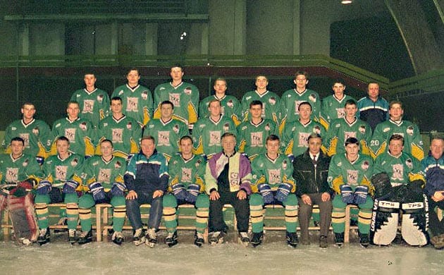Evgeni Romasko (back row, second from left) and THK Tver of Russia's VHL.